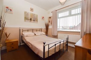 Bedroom One- click for photo gallery